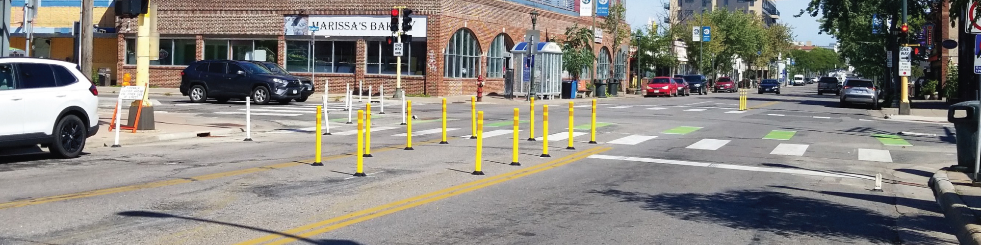 Delineator median and curb extension